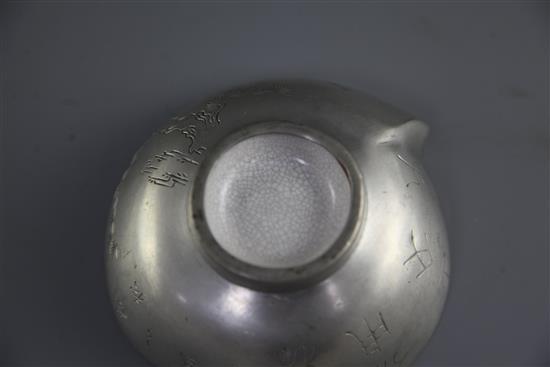 A Chinese Yixing pottery and pewter mounted peach shaped cup, late 19th century, length 13cm